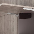 KVSL C MC Solo-Mech lift system installed in cabinetry, Mocha, full-bleed supplementary installation view